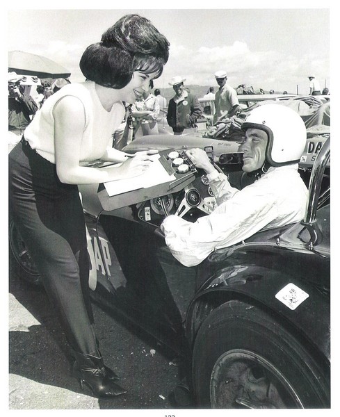 Dave MacDonald with race queen Sharon Brace after win at Cotati 1963